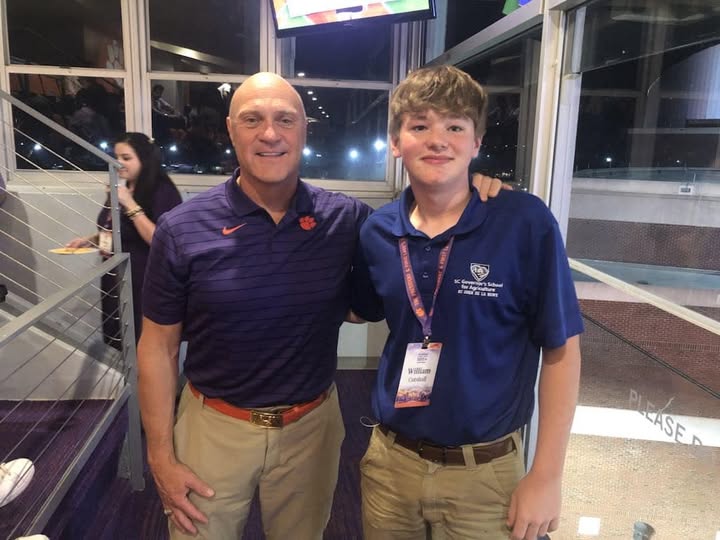 Will Cutshall, on the right, with another attendee at an event